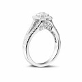0.50 carat solitaire diamond ring in white gold with side diamonds