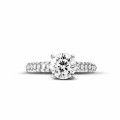 1.50 carat solitaire ring (half set) in white gold with side diamonds