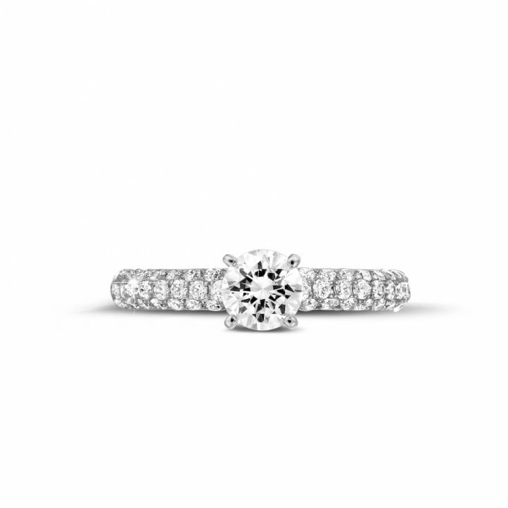 0.70 carat solitaire ring (half set) in white gold with side diamonds