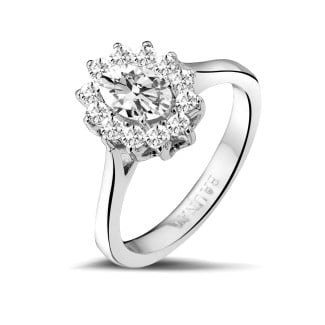 Engagement - 0.90 carat entourage ring in white gold with oval diamond