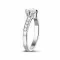 0.70 carat solitaire diamond ring in platinum with side diamonds