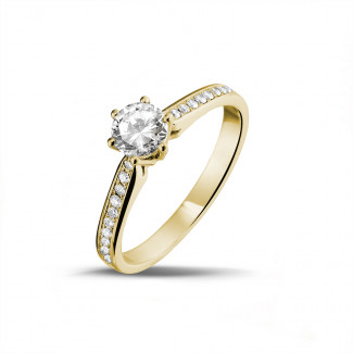 0.50 carat solitaire diamond ring in yellow gold with side diamonds