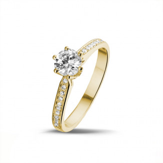 0.70 carat solitaire diamond ring in yellow gold with side diamonds