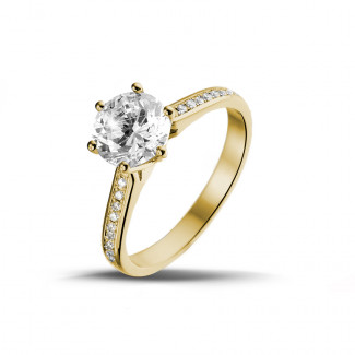 Engagement - 1.50 carat solitaire diamond ring in yellow gold with side diamonds