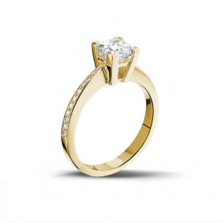 Rings - 1.00 carat solitaire ring in yellow gold with princess diamond and side diamonds
