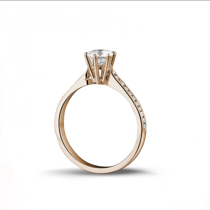 0.70 carat solitaire diamond ring in red gold with side diamonds
