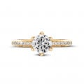 1.00 carat solitaire ring in yellow gold with side diamonds