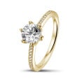 2.00 carat solitaire ring in yellow gold with side diamonds