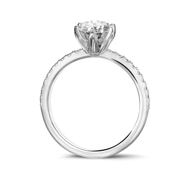 0.90 carat solitaire ring in white gold with side diamonds