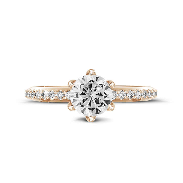 0.50 carat solitaire ring in red gold with side diamonds