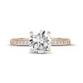 1.25 carat solitaire ring in red gold with four prongs and side diamonds