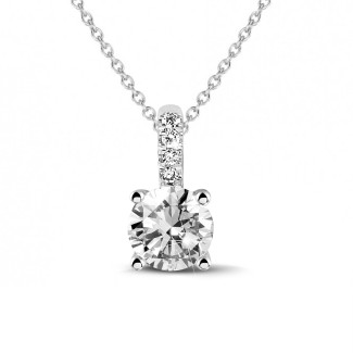 Necklaces - 1.00 carat solitaire pendant in white gold with four prongs and round diamonds