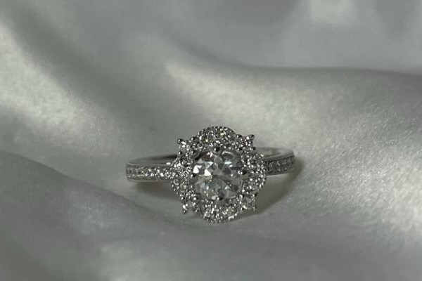 Beautiful diamond ring on white background