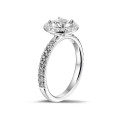 0.90 carat solitaire halo ring in white gold with round diamonds