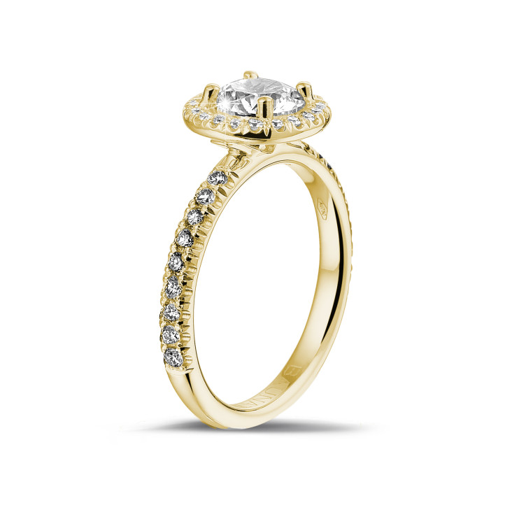 0.90 carat solitaire halo ring in yellow gold with round diamonds