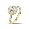 1.25 carat solitaire halo ring in yellow gold with round diamonds