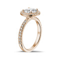 2.00 carat solitaire halo ring in red gold with round diamonds