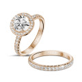 2.00 carat solitaire halo ring in red gold with round diamonds