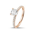 1.20 carat solitaire ring with a cushion diamond in red gold with side diamonds