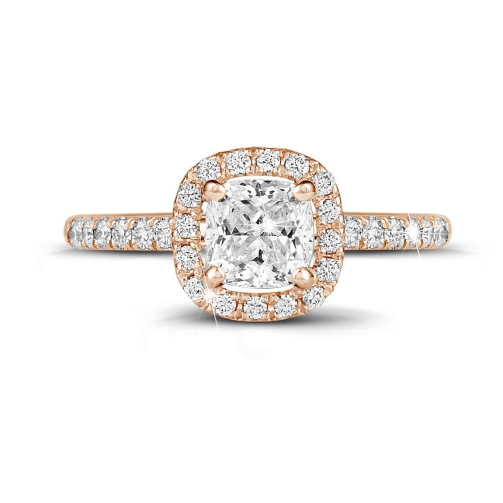2.00 carat solitaire halo ring with a cushion diamond in red gold with round diamonds