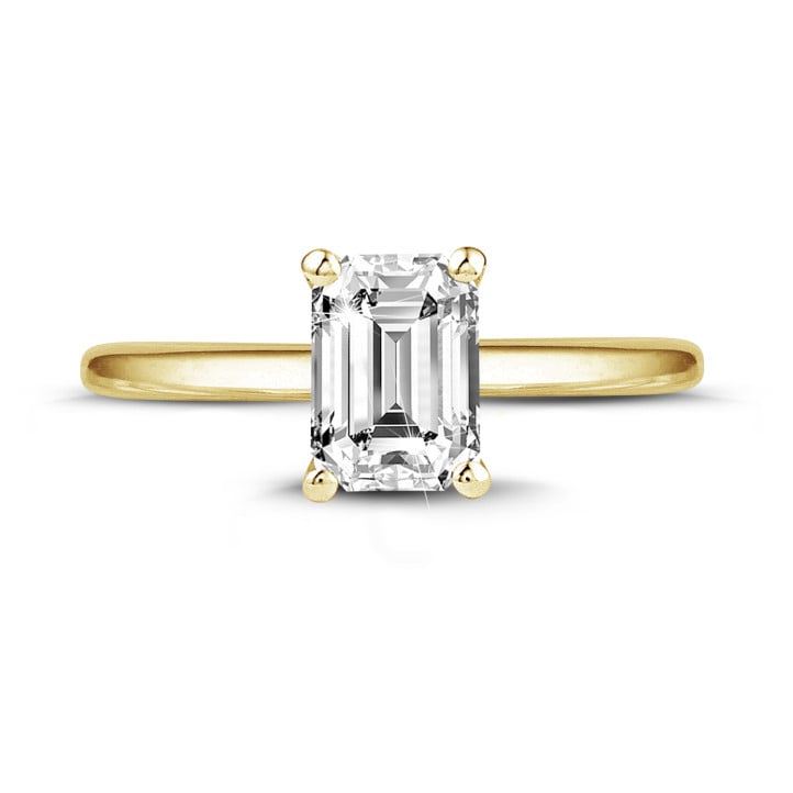 1.50 carat solitaire ring with an emerald cut diamond in yellow gold