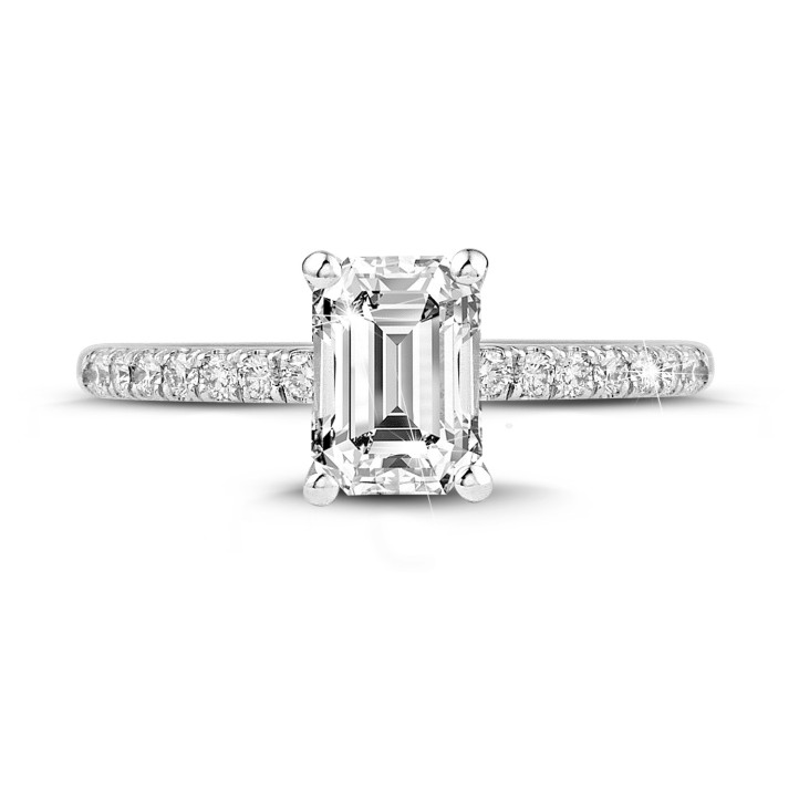 2.00 carat solitaire ring with an emerald cut diamond in white gold with side diamonds