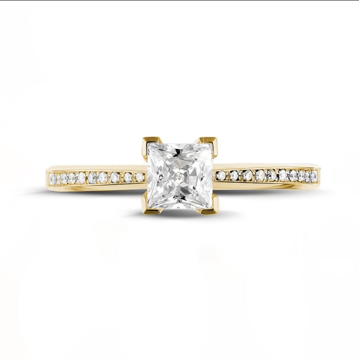 0.50 carat solitaire ring in yellow gold with princess diamond and side diamonds