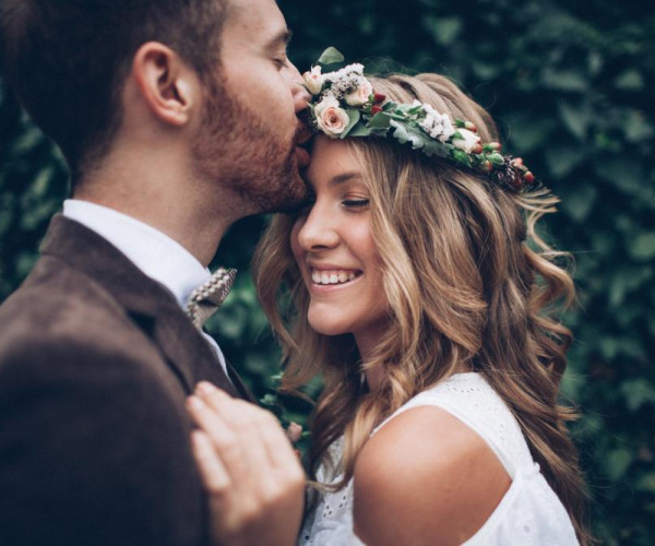 Bridal couple hugging eachother 