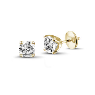 Earrings - solitaire earrings in yellow gold with round diamonds of 0.50 Ct each