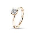 0.70 carat solitaire ring in red gold with round diamond