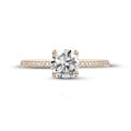 1.25 carat solitaire ring in red gold with side diamonds