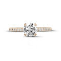 2.50 carat solitaire ring in red gold with side diamonds