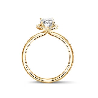 Engagement - 1.50Ct halo ring in yellow gold with oval diamond