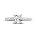 0.70 carat solitaire ring with a princess diamond in white gold with side diamonds