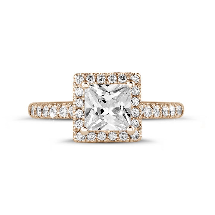 1.00 carat solitaire halo ring with a princess diamond in red gold with round diamonds