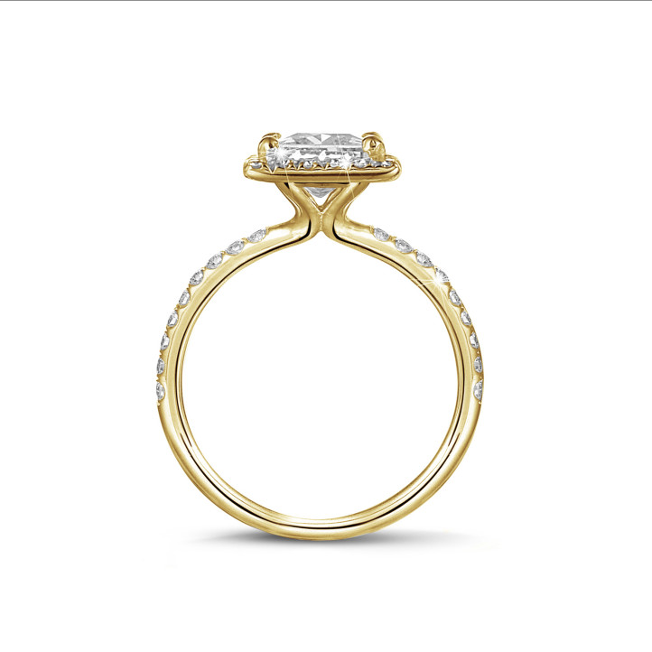 1.50 carat solitaire halo ring with a princess diamond in yellow gold with round diamonds
