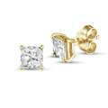 2.00 carat solitaire princess cut diamond earrings in yellow gold