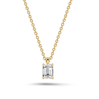 Necklaces - 1.00 carat solitaire emerald cut diamond pendant in yellow gold