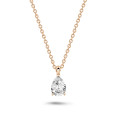 1.00 carat solitaire pear cut diamond pendant in red gold