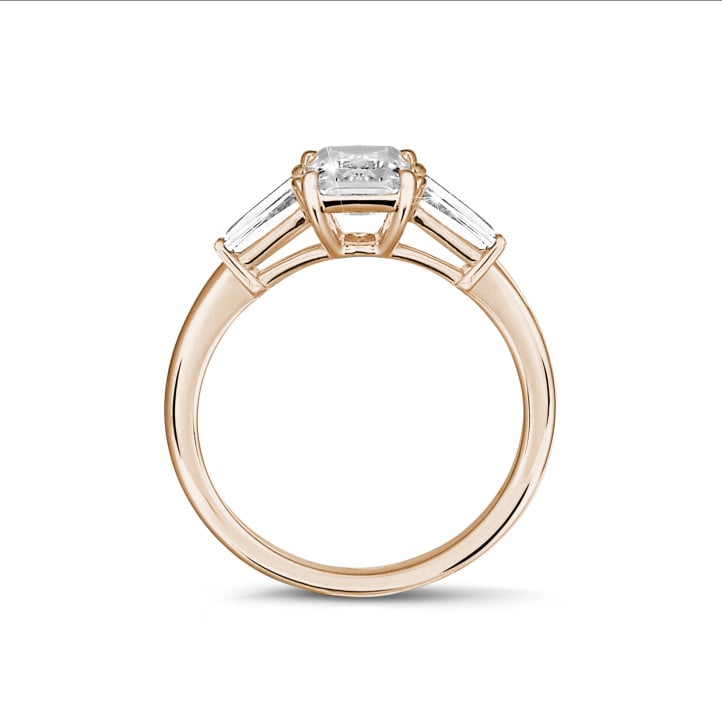 1.00 carat trilogy ring in red gold with a princess diamond and tapered baguettes