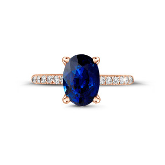 Rings - Ring in red gold with oval sapphire and side diamonds