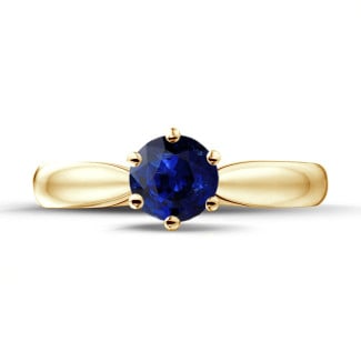 Engagement - Solitaire ring in yellow gold with a round sapphire
