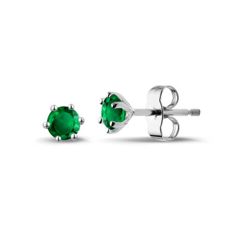 Earrings in white gold with emerald