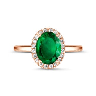Engagement - Halo ring in red gold with an oval emerald