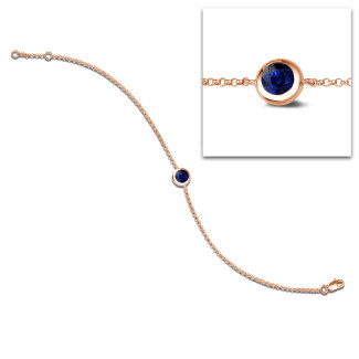 Satellite bracelet in red gold with a round sapphire