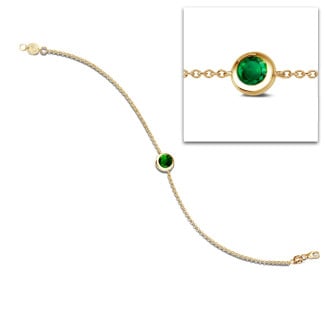 Satellite bracelet in yellow gold with a round emerald