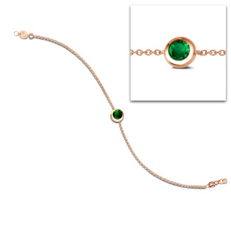 Satellite bracelet in red gold with a round emerald