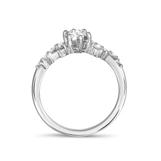 Engagement - 1.00 carat solitaire cluster ring in white gold with marquise diamond