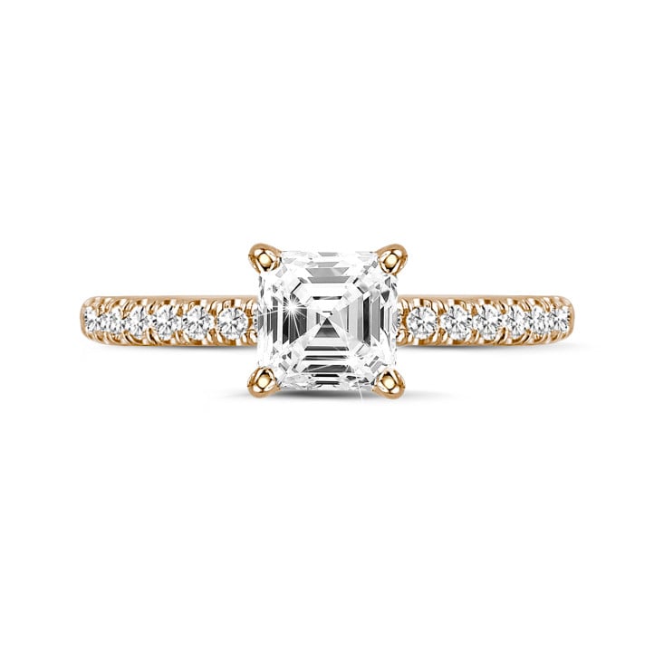 1.50 carat solitaire ring with an asscher cut diamond in red gold and side diamonds