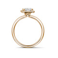 1.00 carat solitaire halo ring with an asscher cut diamond in red gold and round diamonds